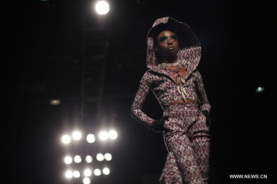 A model presents a creation of Brazilian students, made with textiles from exhibitors, during the GO TEX Show: Textile Products Trade International Fair, in Sao Paulo, Brazil, on Sept. 29, 2015. 