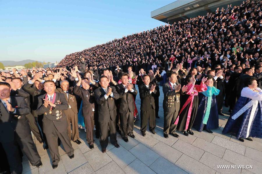 Photo provided by Korean Central News Agency (KCNA) on Oct. 14, 2015 shows top leader of the Democratic People's Republic of Korea (DPRK) Kim Jong Un recently having a photo session with the delegates to the celebrations of the 70th anniversary of the ruling Workers' Party of Korea (WPK) in Pyongyang, capital of the Democratic People's Republic of Korea (DPRK). (Xinhua/KCNA) 