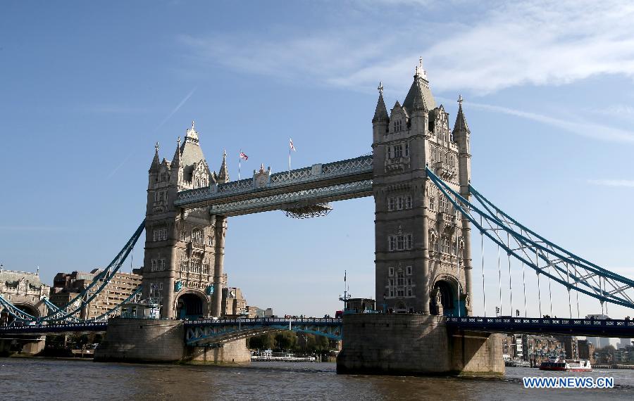 Photo taken on Oct. 22, 2014 shows the Tower Bridge of London. 