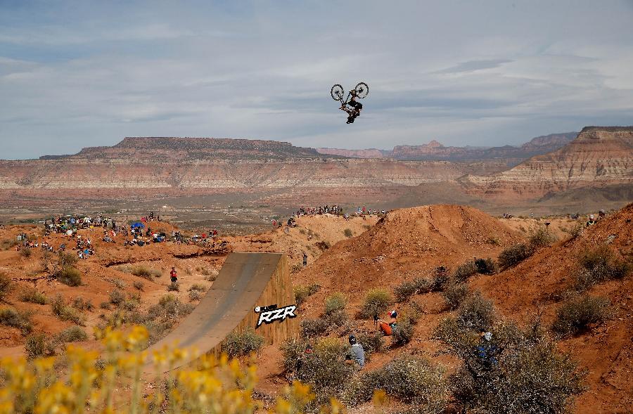 The Red Bull Rampage is an invite-only freeride mountain bike competition held near Zion National Park. (Xinhua/AFP Photo)