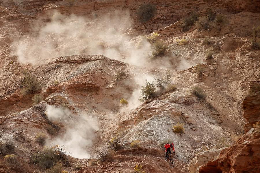 The Red Bull Rampage is an invite-only freeride mountain bike competition held near Zion National Park. (Xinhua/AFP Photo)