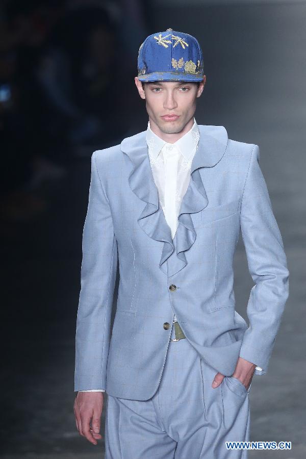A Model presents a creation of the winter collection by Joao Pimenta during the Sao Paulo Fashion Week, in Sao Paulo, Brazil, on Oct. 20, 2015. 