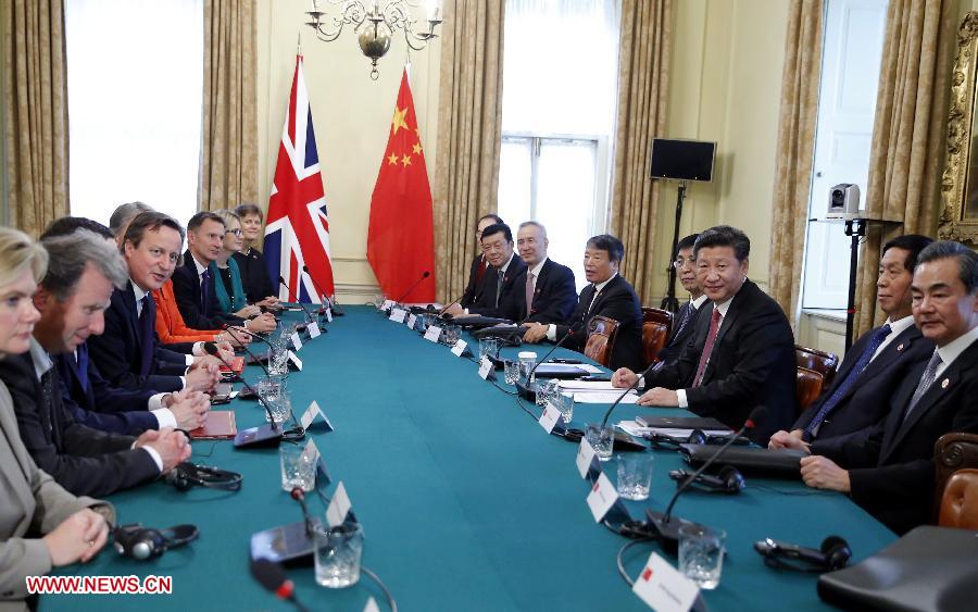 Chinese President Xi Jinping (3rd R) holds talks with British Prime Minister David Cameron at 10 Downing Street in London, Britain, Oct. 21, 2015.