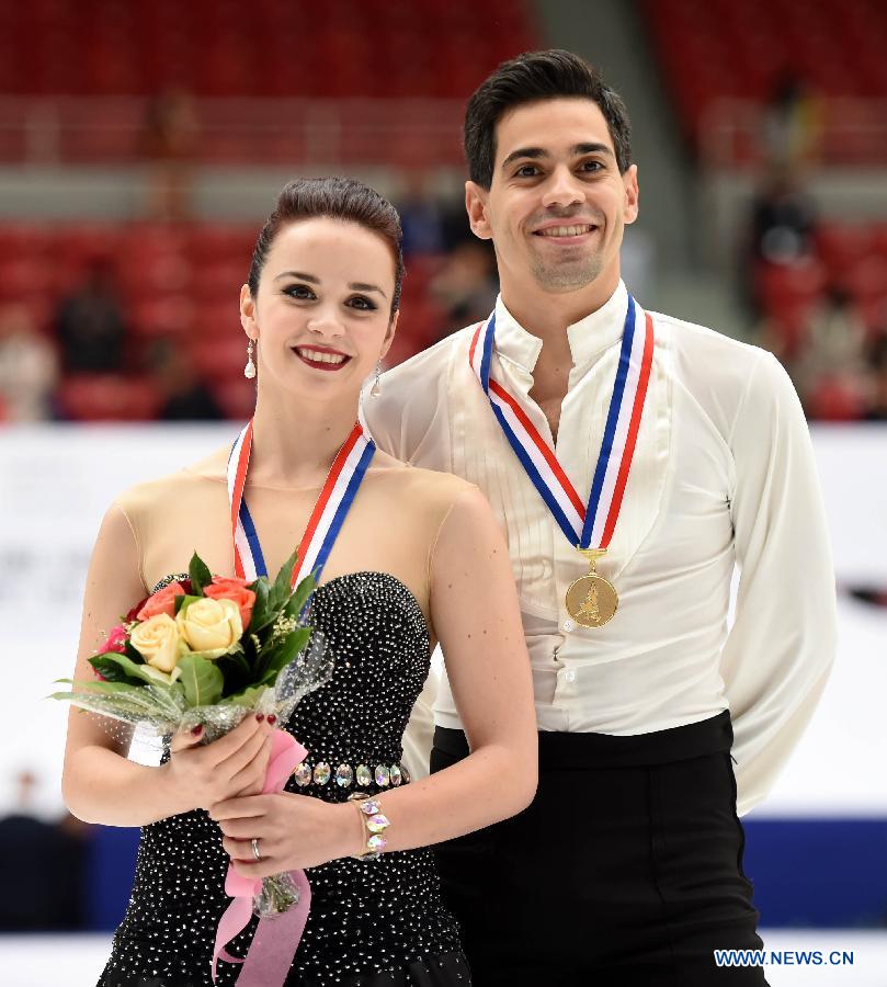 Gold medalists Anna Cappellini (L) and Luca Lanotte of Italy pose during the awarding ceremony of the ice dance category at the 2015 Audi Cup ISU Grand Prix of Figure Skating in Beijing, capital of China, on Nov. 7, 2015. 