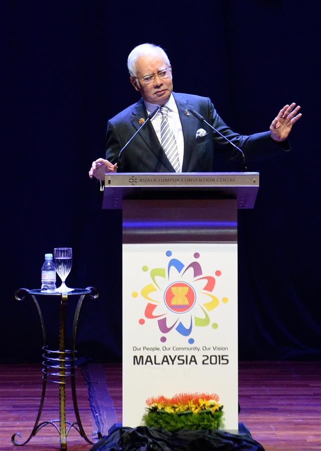 Malaysian Prime Minister Najib Razak addresses the opening ceremony of the 27th summit of the Association of Southeast Asian Nations (ASEAN), in Malaysian capital Kuala Lumpur Nov. 21, 2015. ASEAN leaders gathered here on Saturday to discuss the establishment of the landmark ASEAN Community by Dec. 31 this year and map out a plan for its further development to 2025. (Xinhua/Ma Ping) 
