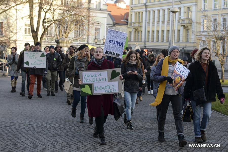 People gathered in Ljubljana's Congress Square to participate in the People's Climate March ahead of the United Nations Conference on Climate Change scheduled to be held in Paris on Monday.