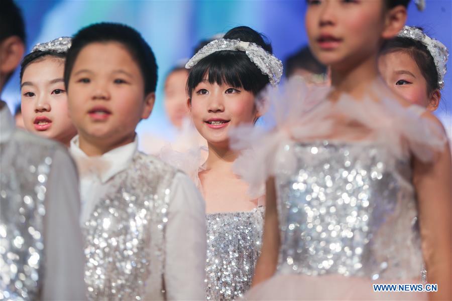 Chinese children perform during a concert at the Children's Art Theater in Shanghai, east China, Dec. 4, 2015.