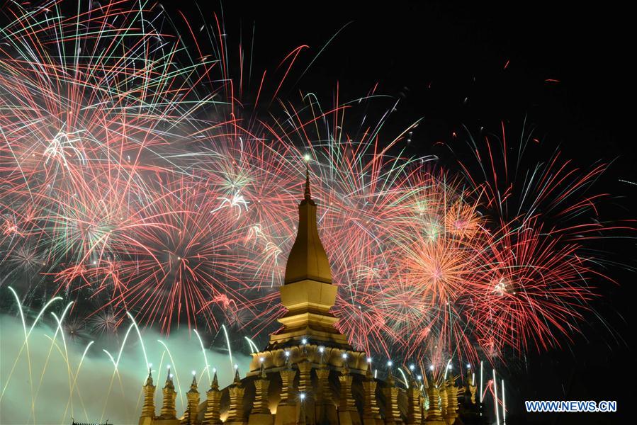 Fireworks explode over the Pha That Luang Square in Vientiane, Dec. 2, 2015 in celebration of the 40th anniversary of the founding of the People's Democratic Republic of Laos.  