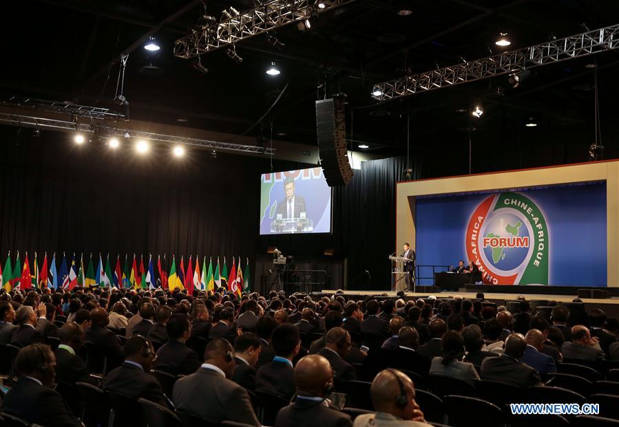 Photo taken on Dec. 4, 2015 shows the high-level dialogue with Chinese and African business dignitaries and closing ceremony of the fifth China-Africa enterprises conference, in Johannesburg, South Africa.  