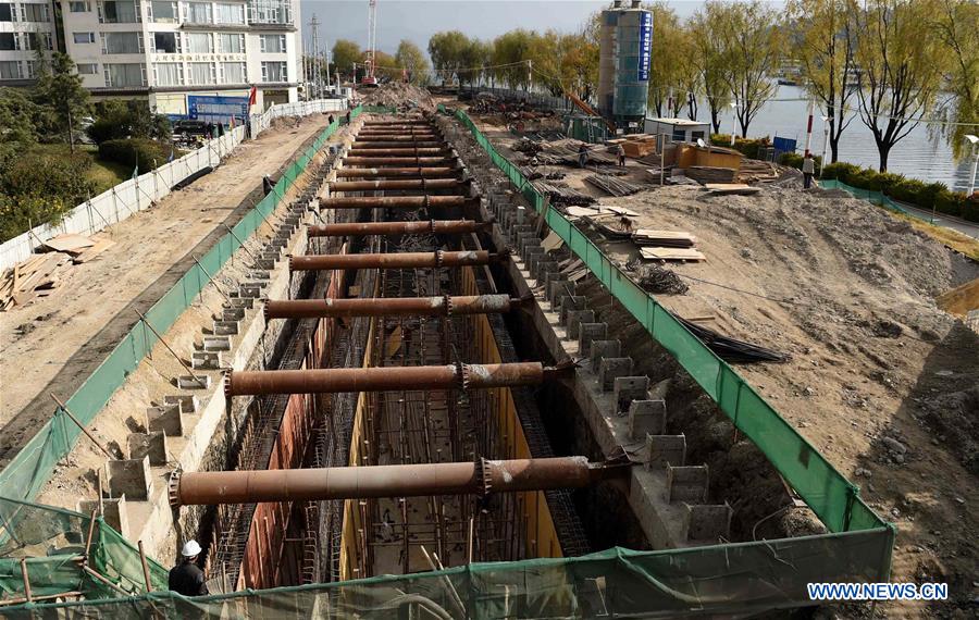 Photo taken on Dec. 9, 2015 shows the construction site of sewage interception project around the Erhai Lake in Dali Bai Autonomous Prefecture, southwest China's Yunnan Province. 