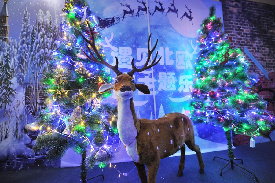 Photo taken on Dec. 15, 2015 shows the decorations of a Christmas theme park at a shopping mall in Qingdao, east China's Shandong Province. A Christmas theme park attracted visitors at a shopping mall in Qingdao on Tuesday. (Xinhua/Wang Haibin)