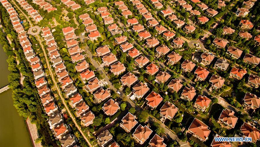 An aerial photo taken on Sep. 10, 2015 shows houses in Pudong District, Shanghai, east China.