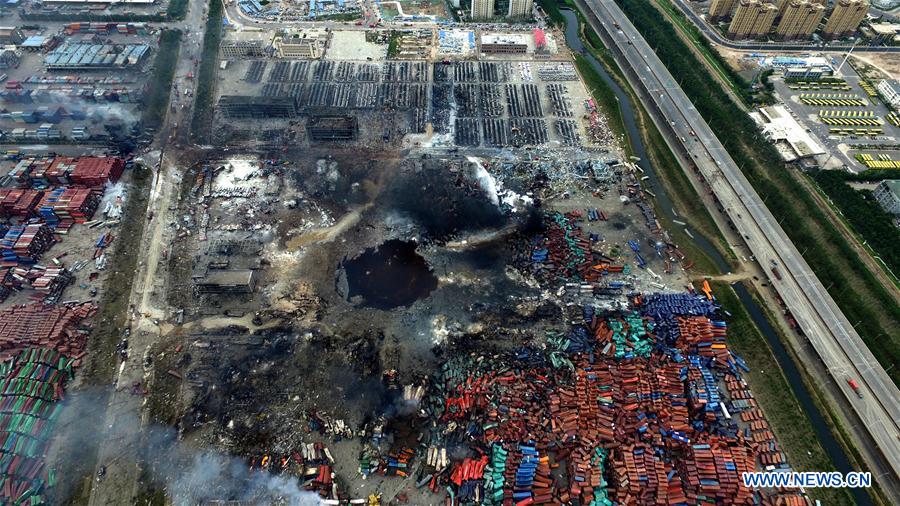  Photo taken on Aug. 14, 2015 shows an aerial view of the warehouse blast site in Binhai New Area of north China's Tianjin Municipality.