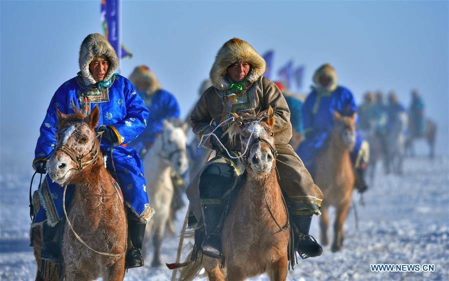 WEST UJIMQIN BANNER, Jan. 5, 2016 (Xinhua) -- Herdsmen riding horses take part in an opening ceremony of horse folk culture in West Ujimqin Banner, north China's Inner Mongolia Autonomous Region, Jan. 5, 2016. (Xinhua/Ren Junchuan)