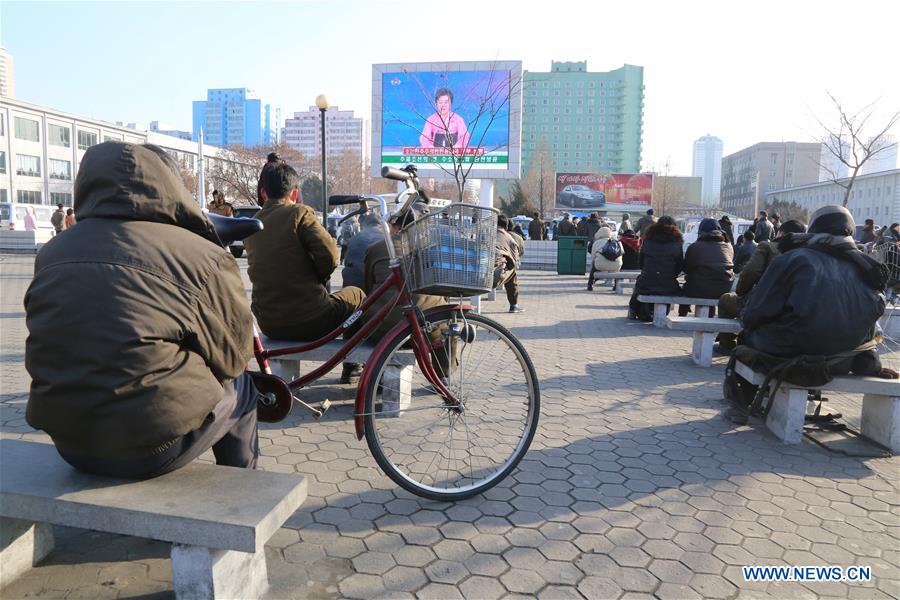 Photo taken on Jan. 6, 2016 shows Pyongyang citizens gathering in front of a big screen at Pyongyang Railway Station in Pyongyang, capital of the Democratic People's Republic of Korea (DPRK), to follow news report on the hydrogen bomb test. 