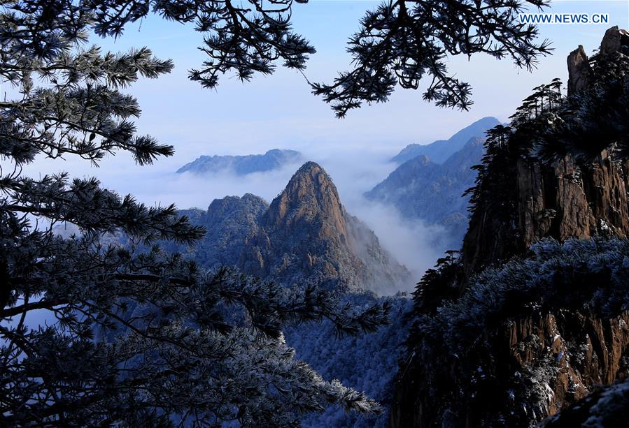 Photo taken on Jan. 13, 2016 shows the sea of clouds after a snowfall at the Huangshan Mountain scenic spot in Huangshan City, east China's Anhui Province. 