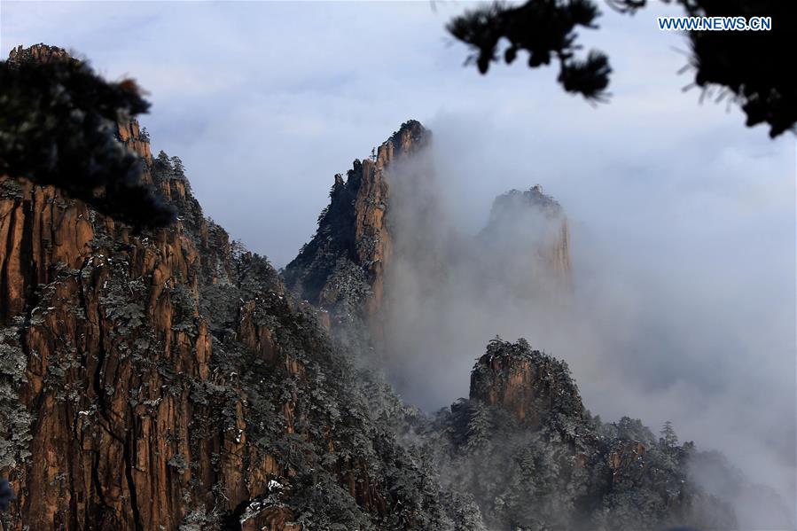 Photo taken on Jan. 13, 2016 shows the sea of clouds after a snowfall at the Huangshan Mountain scenic spot in Huangshan City, east China's Anhui Province.