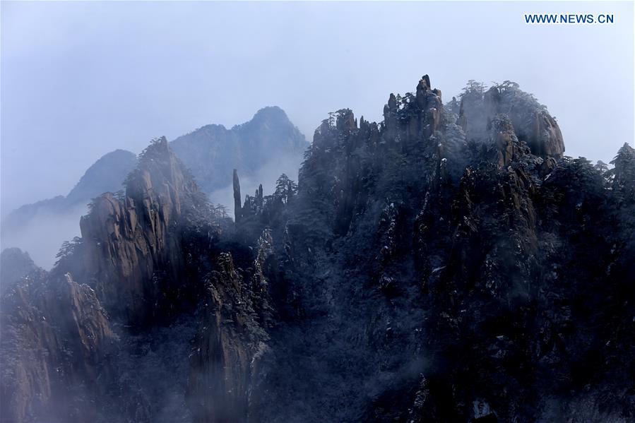 Photo taken on Jan. 13, 2016 shows the sea of clouds after a snowfall at the Huangshan Mountain scenic spot in Huangshan City, east China's Anhui Province.