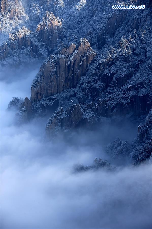 Photo taken on Jan. 13, 2016 shows the sea of clouds after a snowfall at the Huangshan Mountain scenic spot in Huangshan City, east China's Anhui Province. 