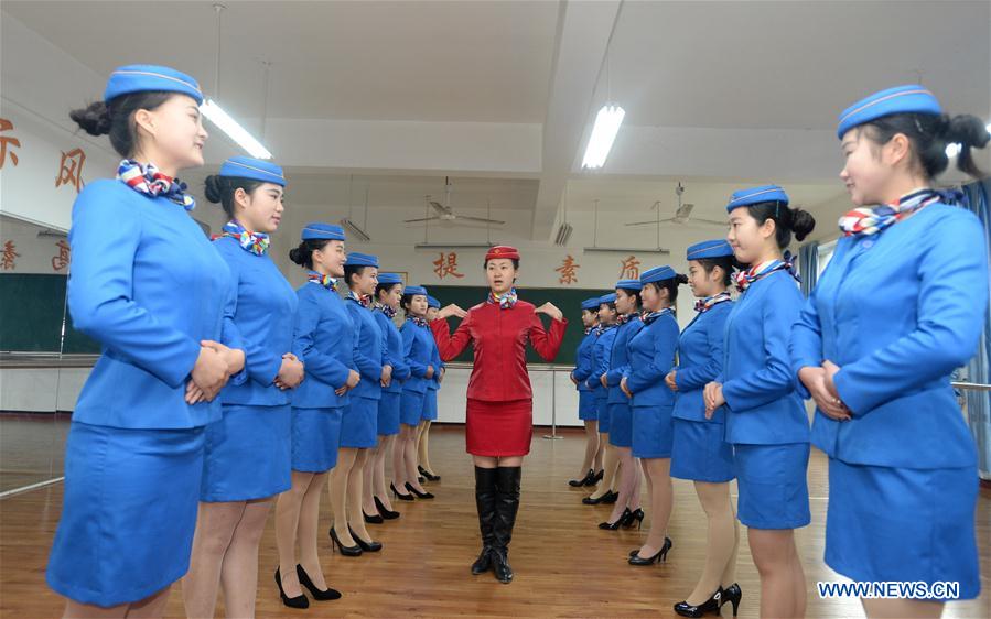 Students exercise in body training at Bishan Vocational Education Center in Chongqing, southwest China, Jan. 13, 2016.