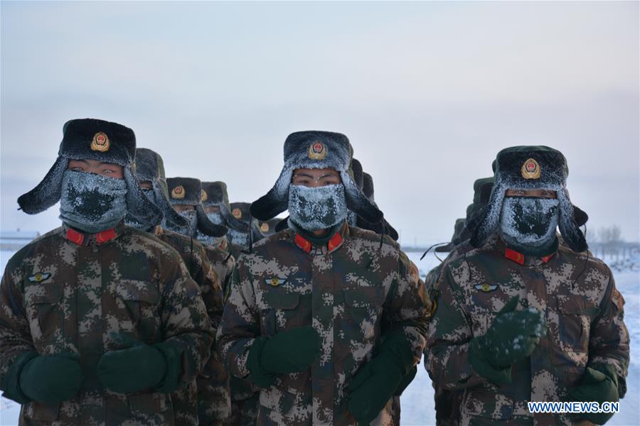Frontier soldiers take part in a training under cold weather in Hulun Buir, north China's Inner Mongolia Autonomous Region, Jan. 19, 2016.