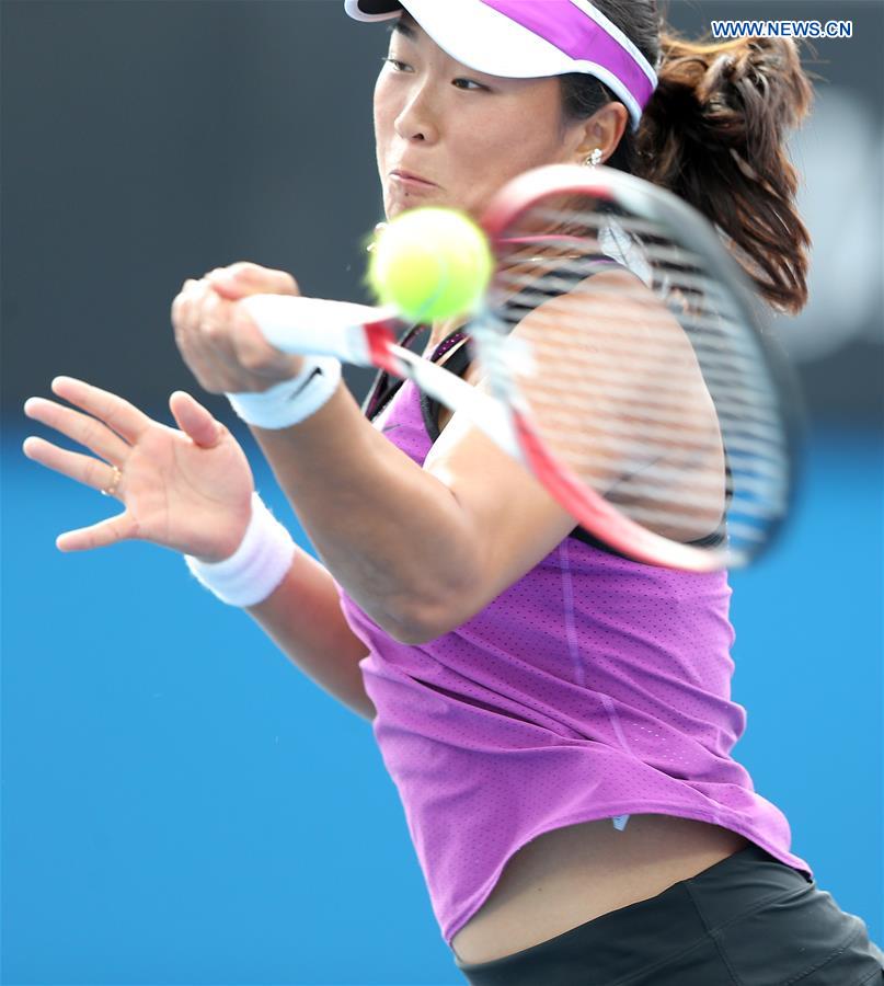 China's Han Xinyun competes with Kazakhstan's Yulia Putintseva during the second round match of women's singles at the Australian Open Tennis Championshis in Melbourne, Australia, Jan. 20, 2016. 