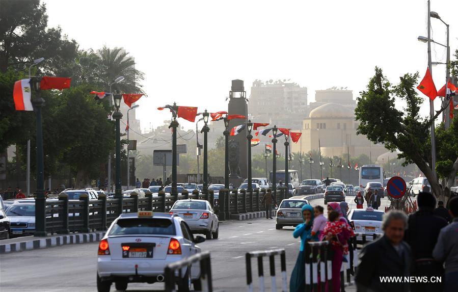 Chinese and Egyptian national flags are seen along the streets in Cairo, capital of Egypt, Jan. 19, 2016