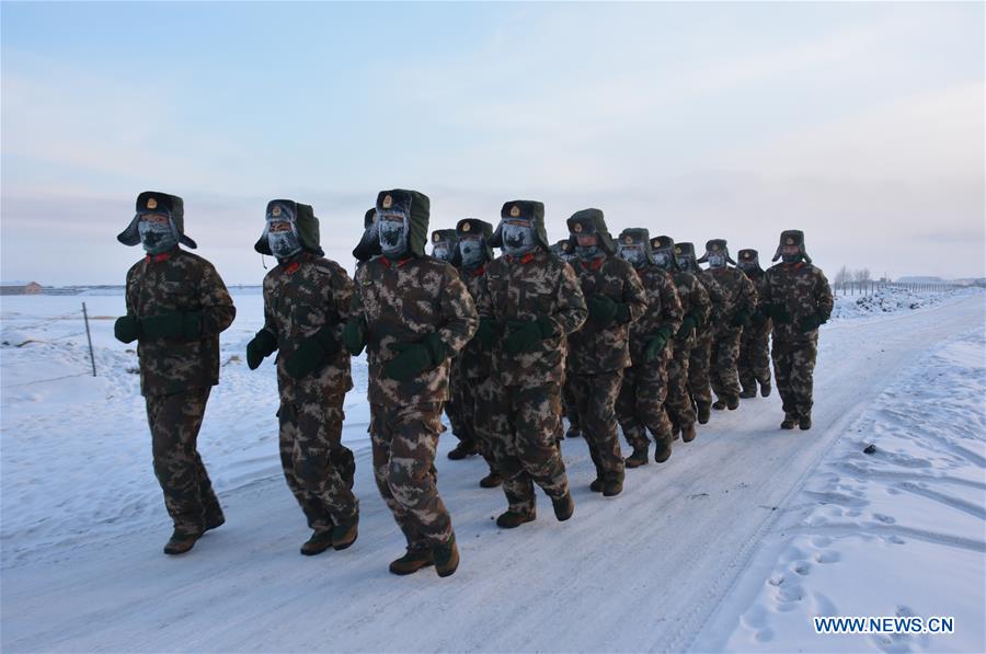 Frontier soldiers take part in a training under cold weather in Hulun Buir, north China's Inner Mongolia Autonomous Region, Jan. 19, 2016. 
