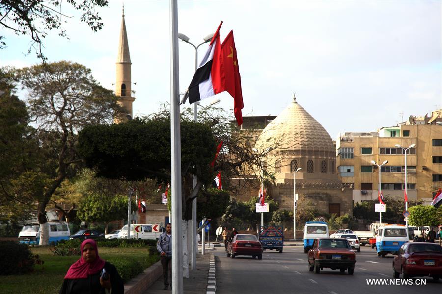 Chinese and Egyptian national flags are seen along the streets in Cairo, capital of Egypt, Jan. 19, 2016