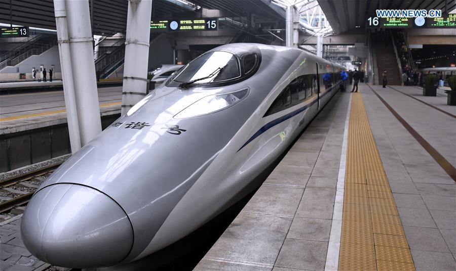 Photo taken on Jan. 21 2016 shows a CRH hight speed train, which departs for Guangzhou South Railway Station, waiting at Beijing West Railway Station in Beijing, capital of China.