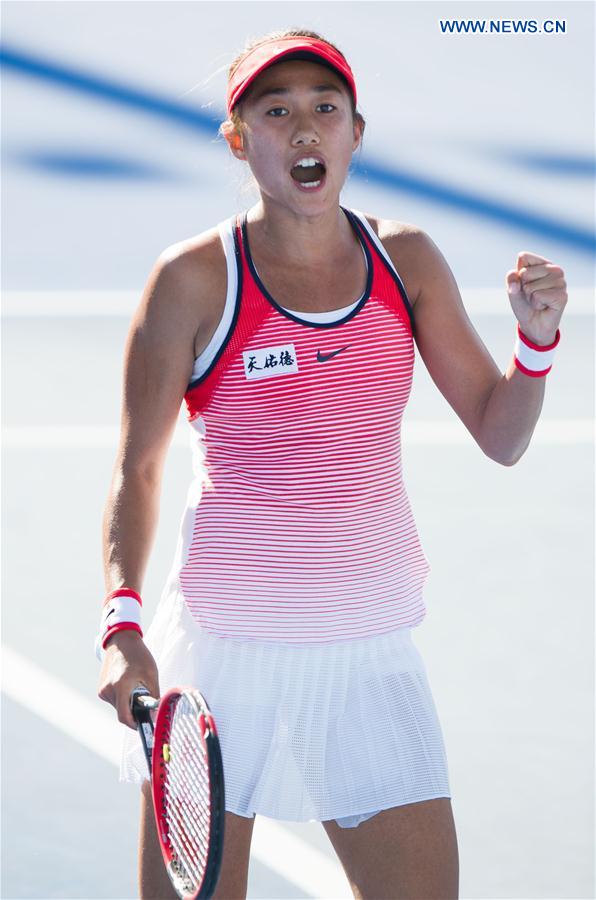 China's Zhang Shuai reacts during the second round match of women's singles of Australian Open Tennis Championships against Alize Cornet of France in Melbourne, Australia, Jan. 21, 2016.