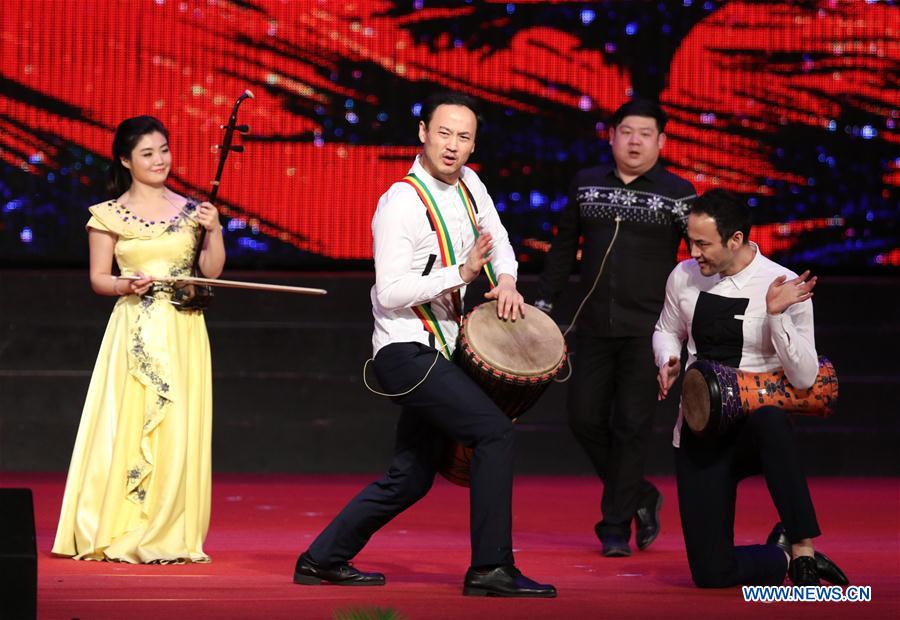 Chinese artists perform in Phnom Penh, Cambodia, on Jan. 21, 2016.