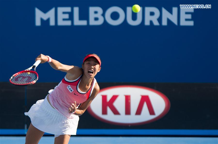 China's Zhang Shuai serves the ball during the second round match of women's singles of Australian Open Tennis Championships against Alize Cornet of France in Melbourne, Australia, Jan. 21, 2016. 