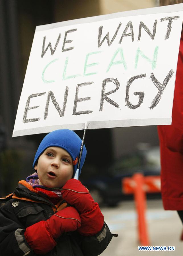 A child participates in a rally in Vancouver, Canada, Jan. 23, 2016. Hundreds of people staged a protest against the pipeline expansion in British Columbia.
