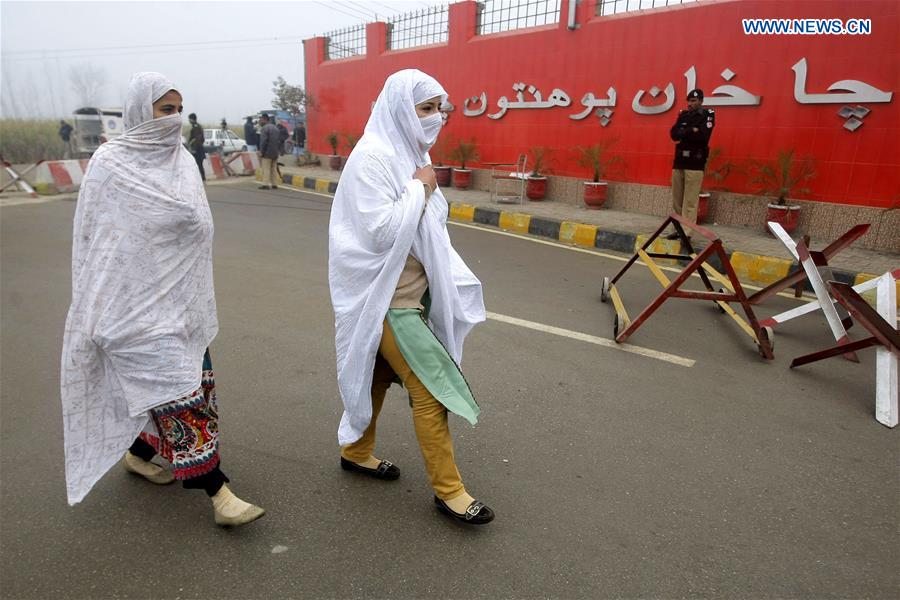 Pakistani students arrive at the Bacha Khan University in Charsadda, northwest Pakistan, Jan. 25, 2016. 