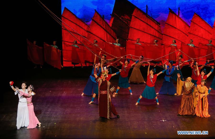 Artists perform in a traditional Chinese dance drama entitled 'The Silk Road on the Sea', in Brussels, capital of Belgium, Jan. 26, 2016.