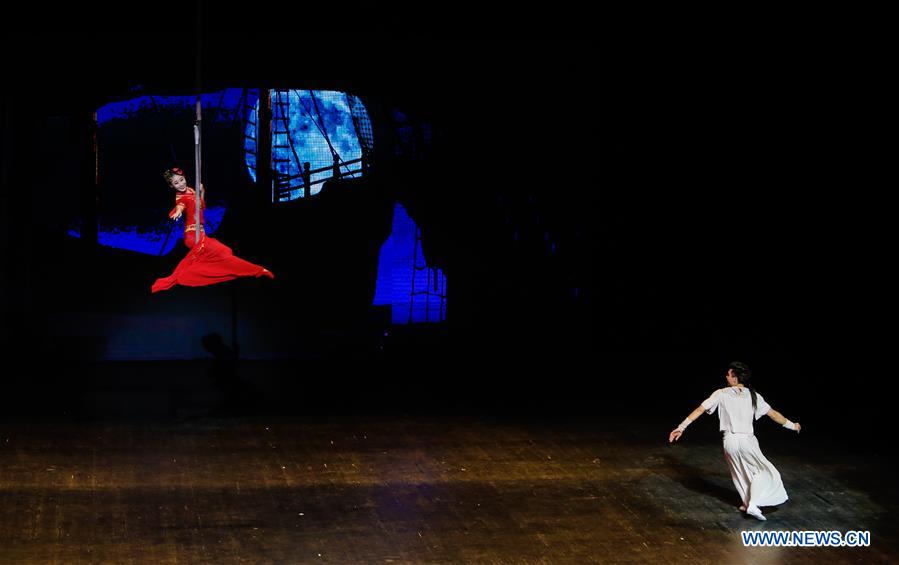 Artists perform in a traditional Chinese dance drama entitled 'The Silk Road on the Sea', in Brussels, capital of Belgium, Jan. 26, 2016. 