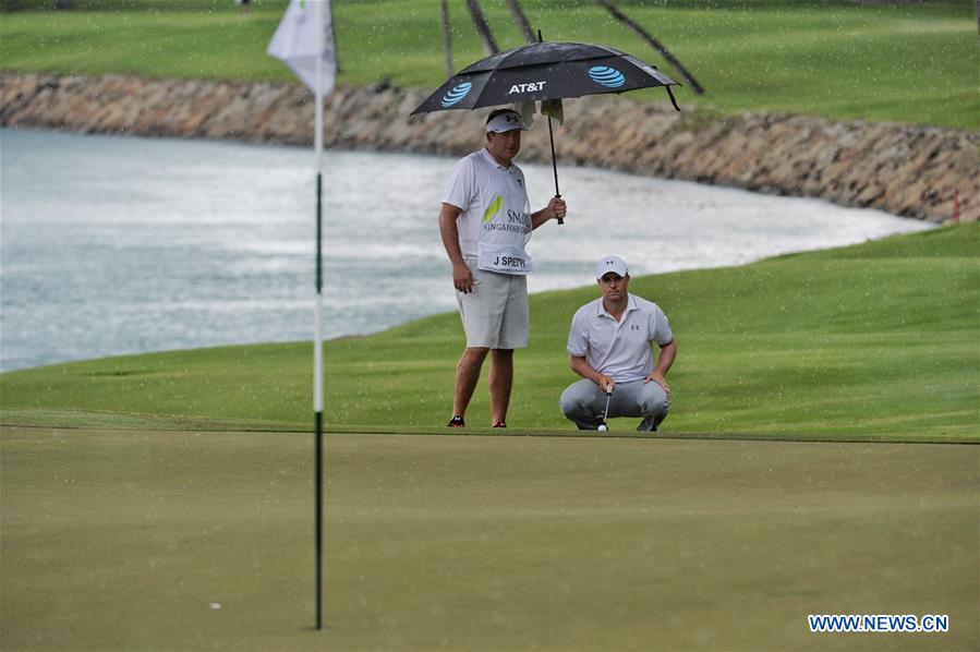 Jordan Spieth (R) of the United States competes during the SMBC Singapore Open held at Sentosa Golf Club Serapong course, Singapore, Jan. 29, 2016.