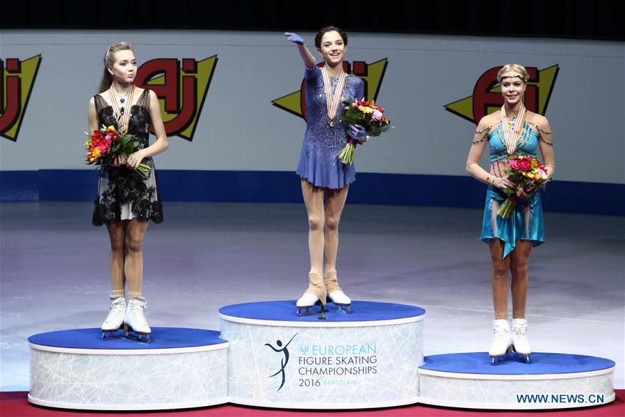  BRATISLAVA, Jan. 30, 2016 (Xinhua) -- Gold medalist of the ladies free program Evgenia Medvedeva (C) of Russia poses on podium with silver medalist Elena Radionova of Russia (L) and bronze medalist Anna Pogorilaya of Russia during the awards ceremony at the 79th European Figure Skating Championships in Bratislava, capital of Slovakia, on Jan. 29, 2016. (Xinhua/Andrej Klizan) 