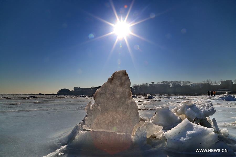 Due to a strong cold front, sea ice appeared along the seaside at Bohai Sea coast in Qinhuangdao.