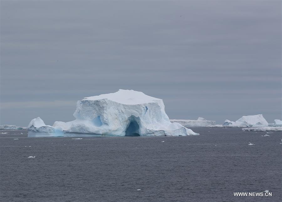 Photo taken from Chinese icebreaker 'Xuelong', meaning Snow Dragon, shows an iceberg near the Antarctic Peninsula, on Dec. 28, 2015. (Xinhua/Zhu Jichai)