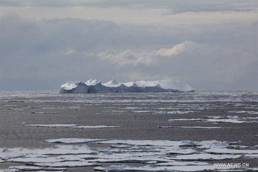 Photo taken from Chinese icebreaker 'Xuelong', meaning Snow Dragon, shows an iceberg and floating ice in Amundsen Sea, on Jan. 30, 2016.