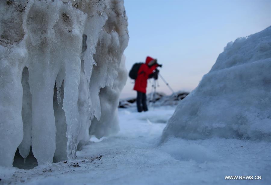 Due to a strong cold front, sea ice appeared along the seaside at Bohai Sea coast in Qinhuangdao.