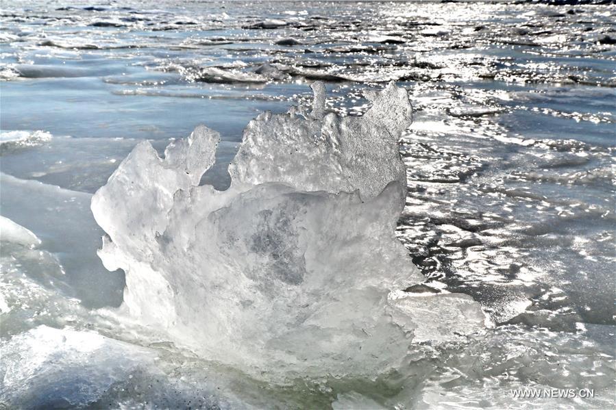 Due to a strong cold front, sea ice appeared along the seaside at Bohai Sea coast in Qinhuangdao.