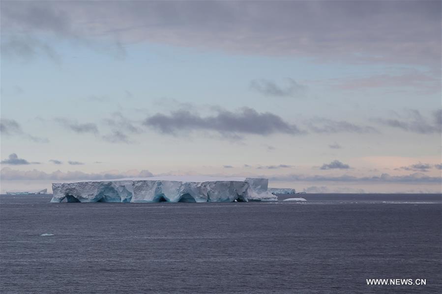 Photo taken from Chinese icebreaker 'Xuelong', meaning Snow Dragon, shows an iceberg and floating ice in Amundsen Sea, on Jan. 30, 2016.