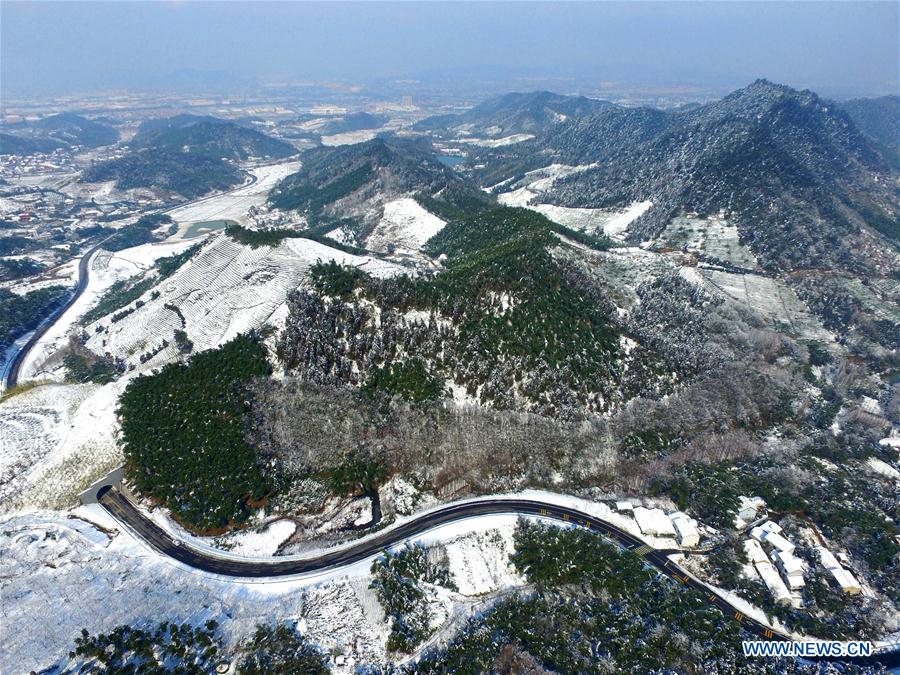 Photo taken on Feb. 2, 2016 shows the Lingfeng scenic spot after a snowfall in Anji County, east China's Zhejiang Province. A snowfall hit the county from Jan. 31. 