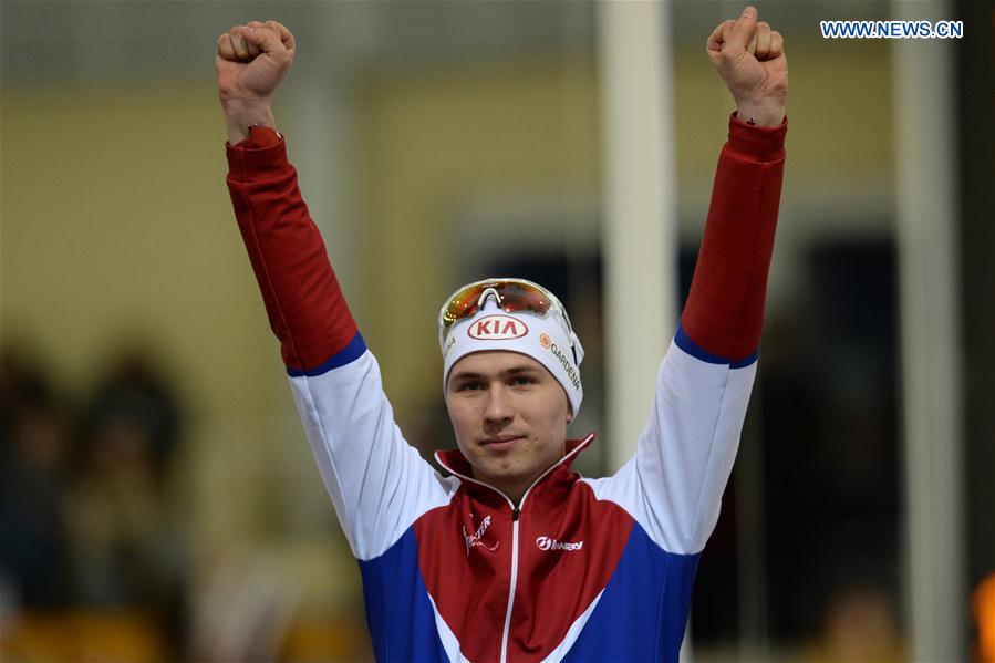 Gold medalist Pavel Kulizhnikov of Russia poses during the awarding ceremony of the men's 1000m event at ISU world single distances speed skating championships in Kolomna, Russia, on Feb. 13, 2016. 
