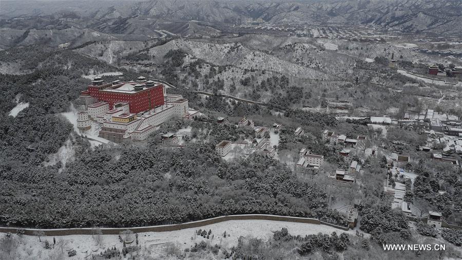 Aerial photo taken on Feb. 13, 2016 shows the snow scenery at the Summer Resort in Chengde, north China's Hebei Province. 