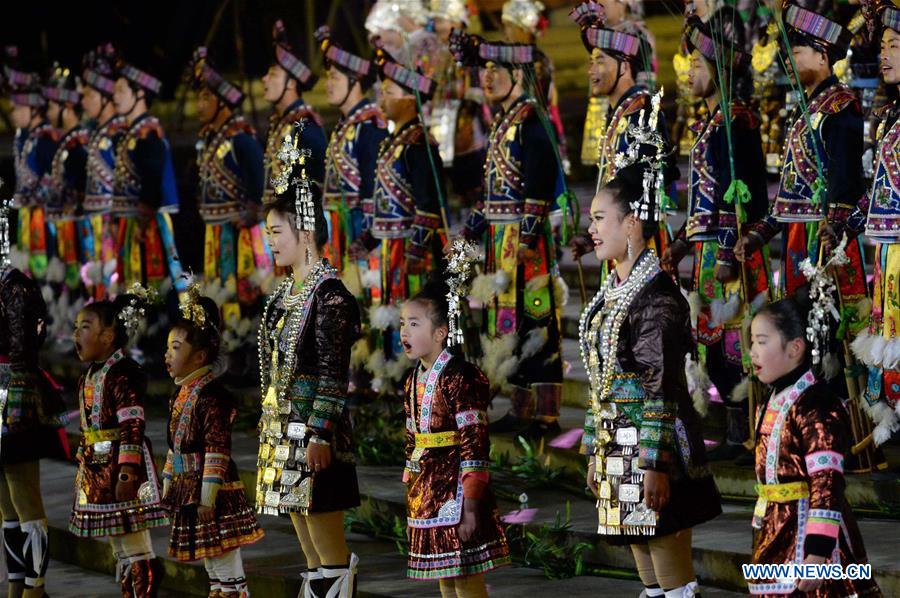 Actors perform during the opening ceremony of the Dong Culture Tourism Festival in Liping County, Qiandongnan Miao and Dong Autonomous Prefecture, southwest China's Guizhou Province, Feb. 14, 2016. 