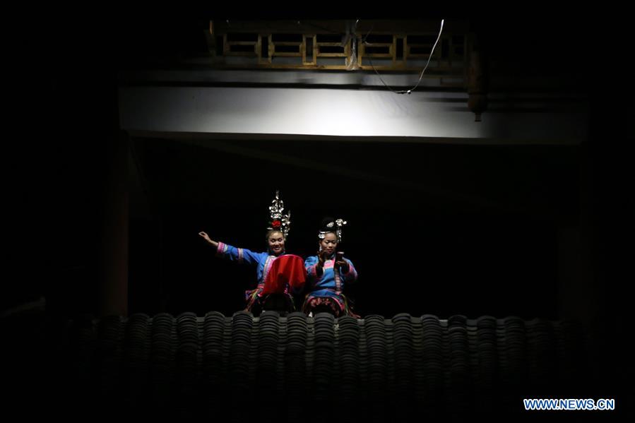 Actors perform during the opening ceremony of the Dong Culture Tourism Festival in Liping County, Qiandongnan Miao and Dong Autonomous Prefecture, southwest China's Guizhou Province, Feb. 14, 2016. 